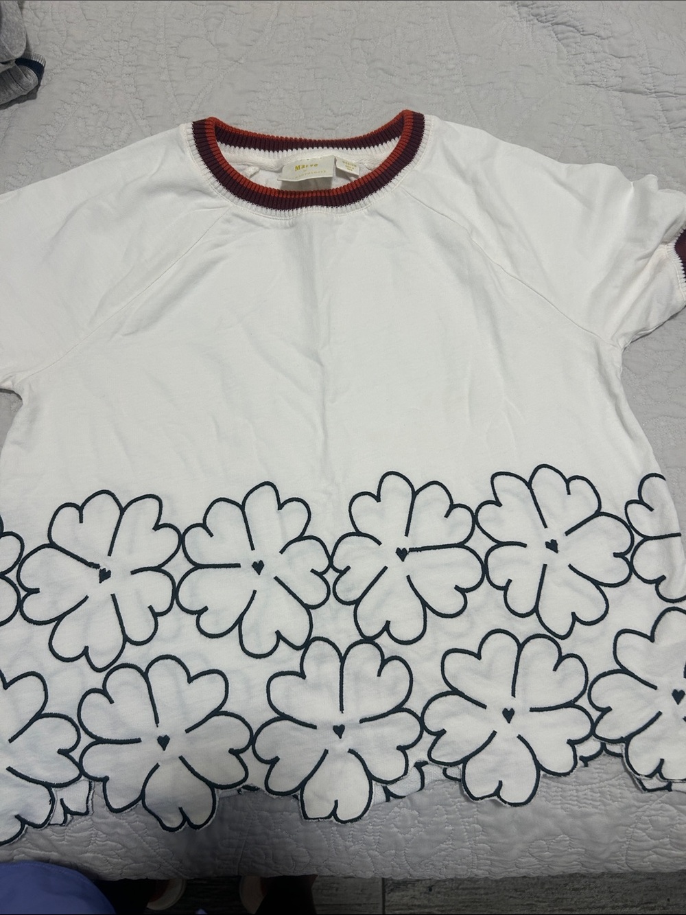 Maeve White Short-Sleeve Tee with Black Floral Outline and Rust Trim